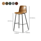 Tabouret de bar industriel en cuir avec structure métallique et repose-pieds