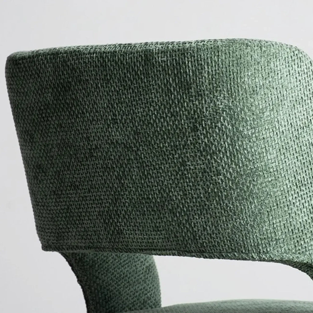 Chaise de salle à manger moderne en coton et lin vert, recouverte d'un revêtement en coton.