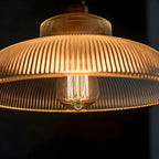 Suspension minimaliste en verre transparent avec corde dorée
