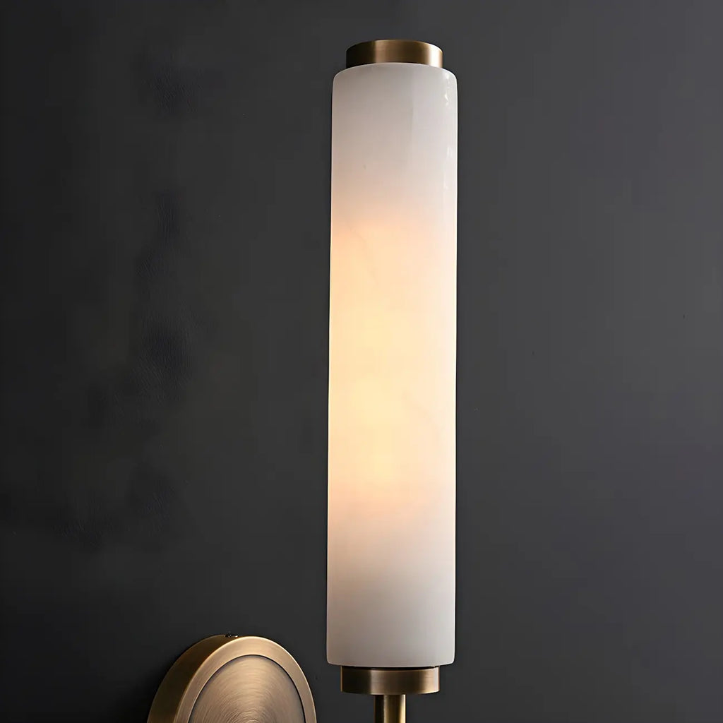 Applique murale moderne cylindrique en pierre dorée avec éclairage LED pour chambre