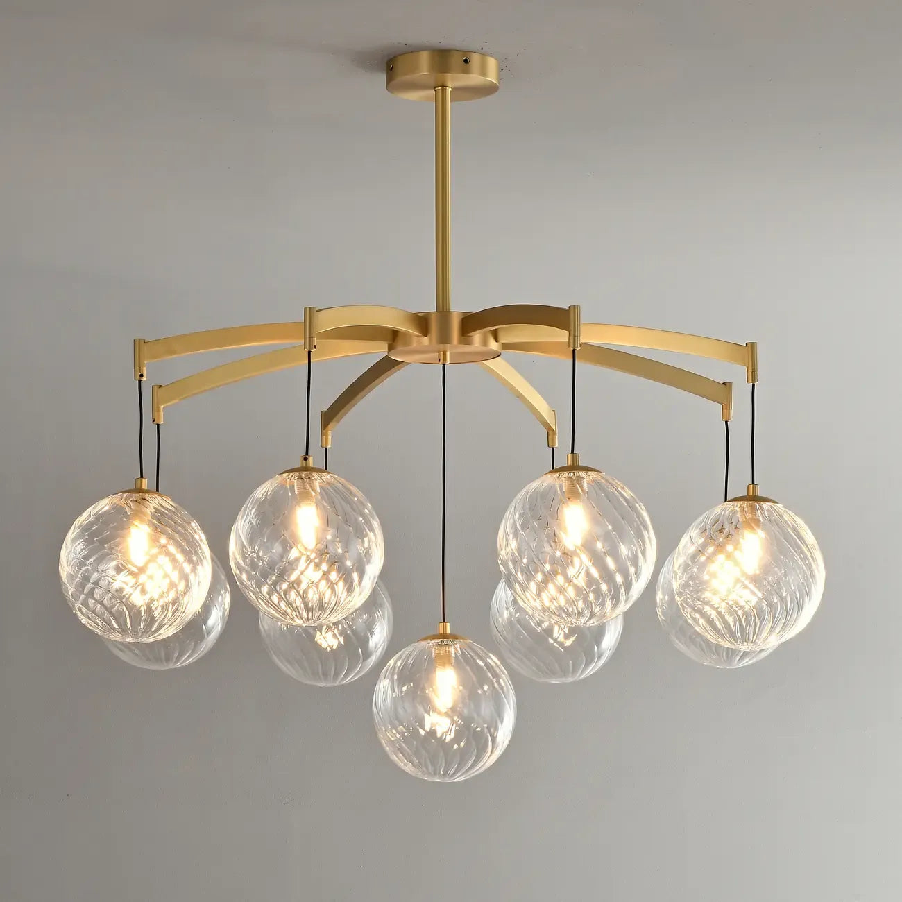 Lustre sphérique en verre doré et cristal, design moderne et élégant