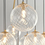 Lustre sphérique en verre doré et cristal, design moderne et élégant