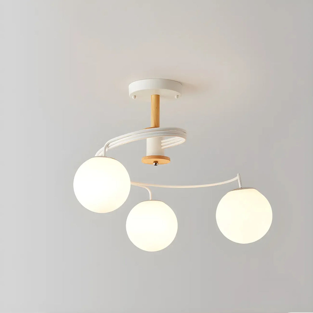 Plafonnier semi-encastré moderne en métal avec ampoule globe.