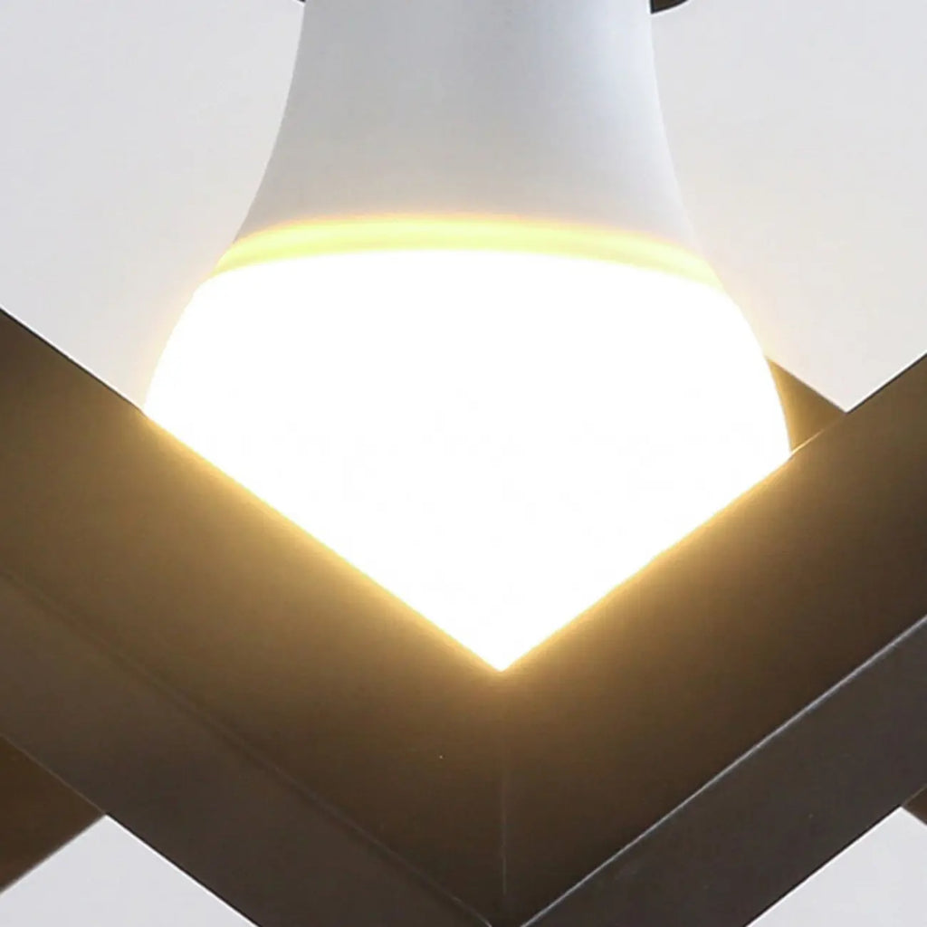 Suspension géométrique industrielle en métal noir pour îlot de lumière