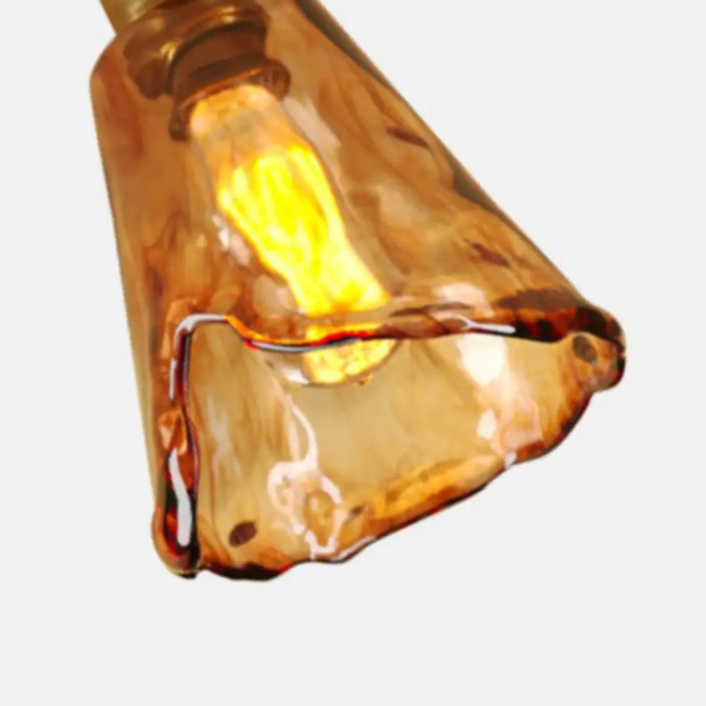 Plafonnier semi-encastré moderne en laiton et verre ambré, forme conique.