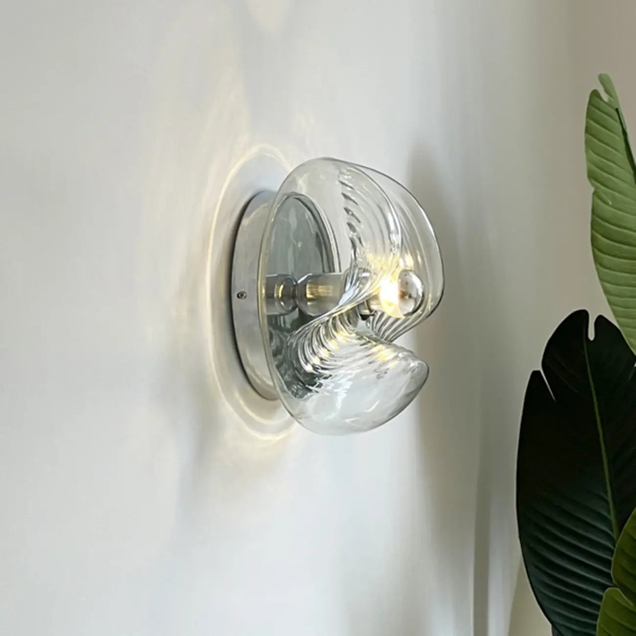 Applique murale ronde contemporaine en verre transparent