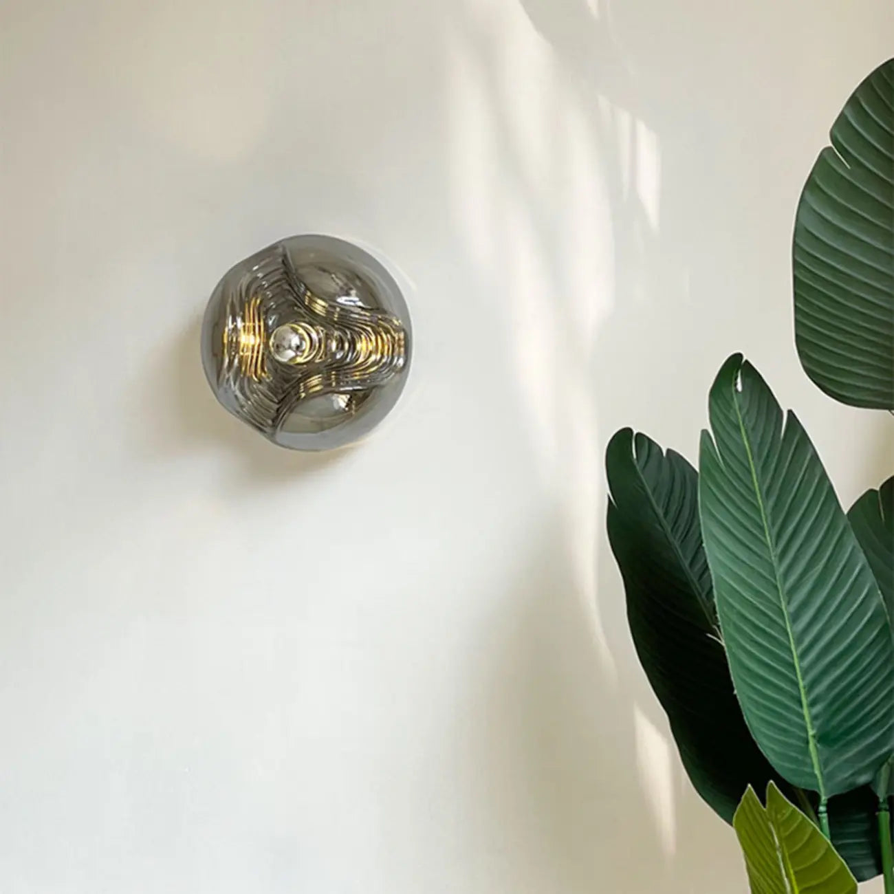 Applique murale ronde contemporaine en verre transparent