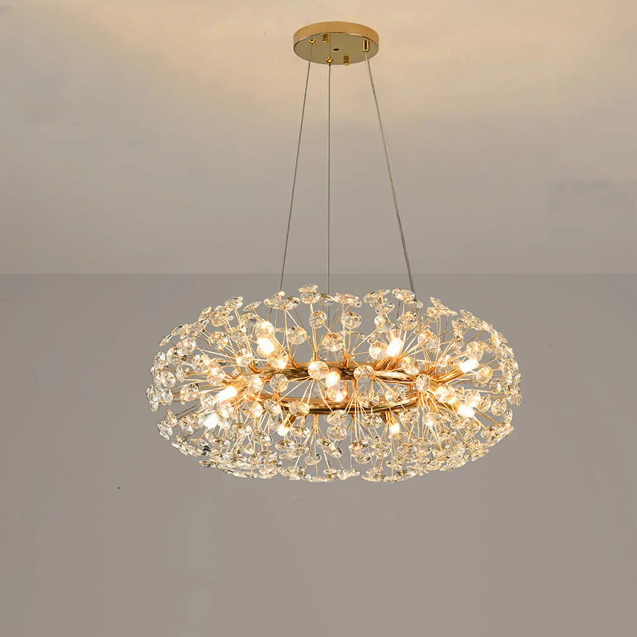 Lampadario regolabile in altezza a globo di cristallo oro a stella