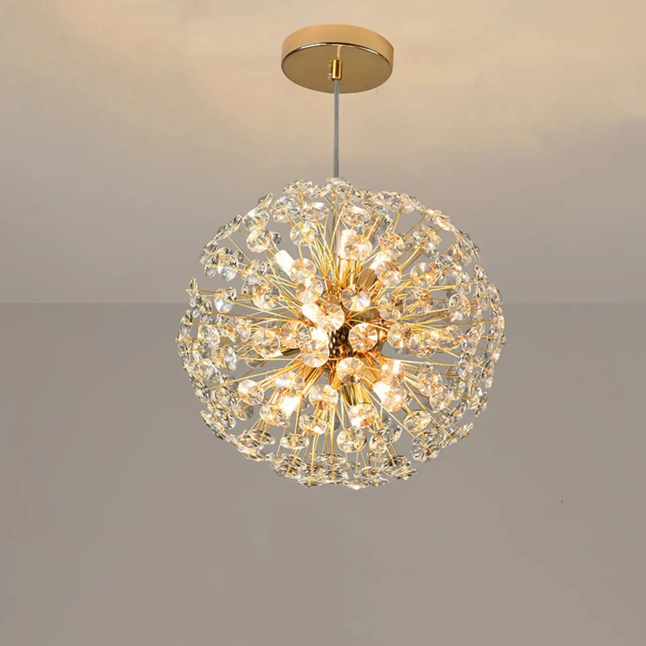 Lampadario regolabile in altezza a globo di cristallo oro a stella