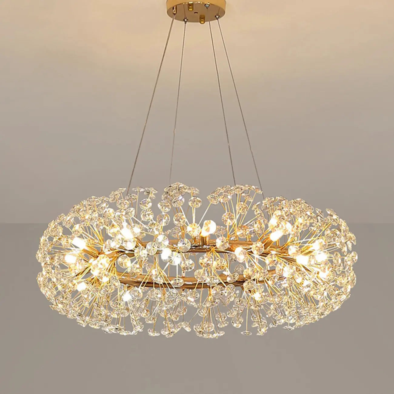Lampadario regolabile in altezza a globo di cristallo oro a stella