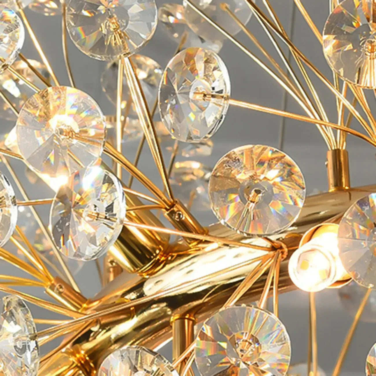Lampadario regolabile in altezza a globo di cristallo oro a stella