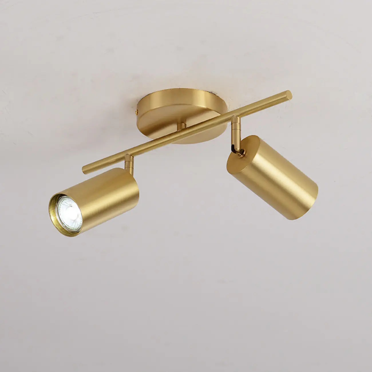 Luminaire sur rail réglable cylindrique doré minimaliste semi-encastré