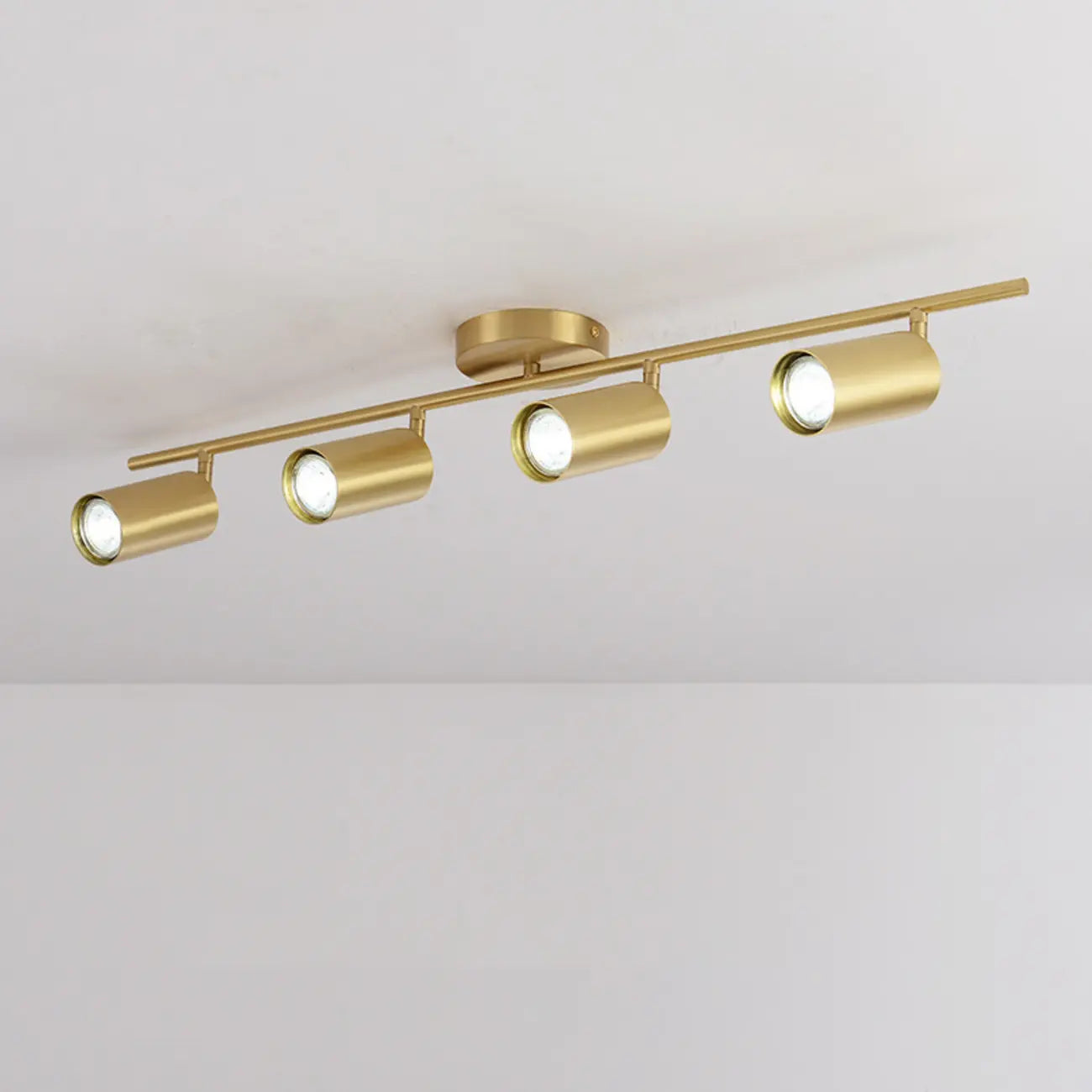 Luminaire sur rail réglable cylindrique doré minimaliste semi-encastré
