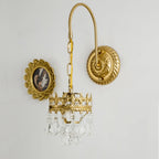 Luxueuse applique murale suspendue vintage en laiton antique avec cristal