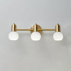 Applique murale moderne en verre blanc et or avec dôme, idéale pour salle de bain.