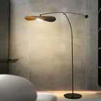 Lampadaire arqué moderne en métal noir et or de 63 pouces avec bras oscillant