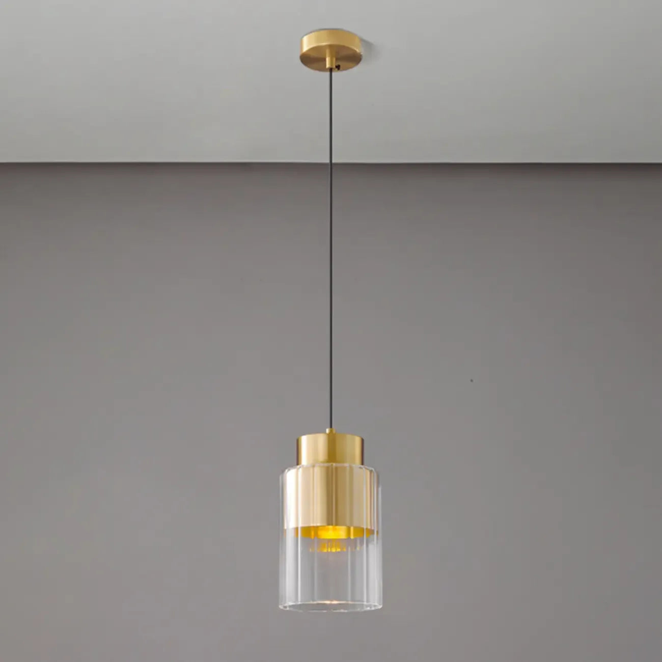 Suspension minimaliste cylindrique en laiton et verre transparent