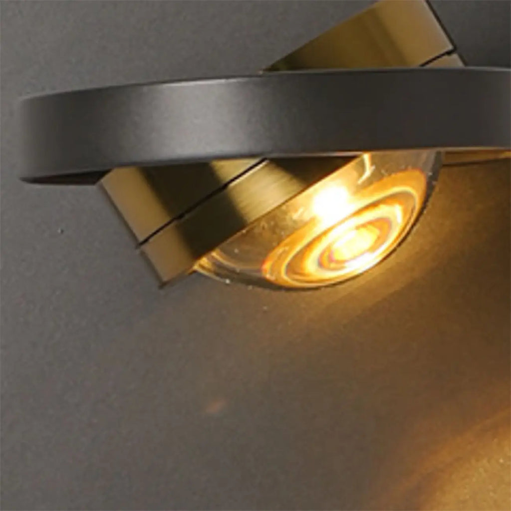 Lampada da parete rotonda in metallo con vetro trasparente e rotazione a 360°