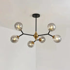 Lustre Sputnik moderne en verre noir et or