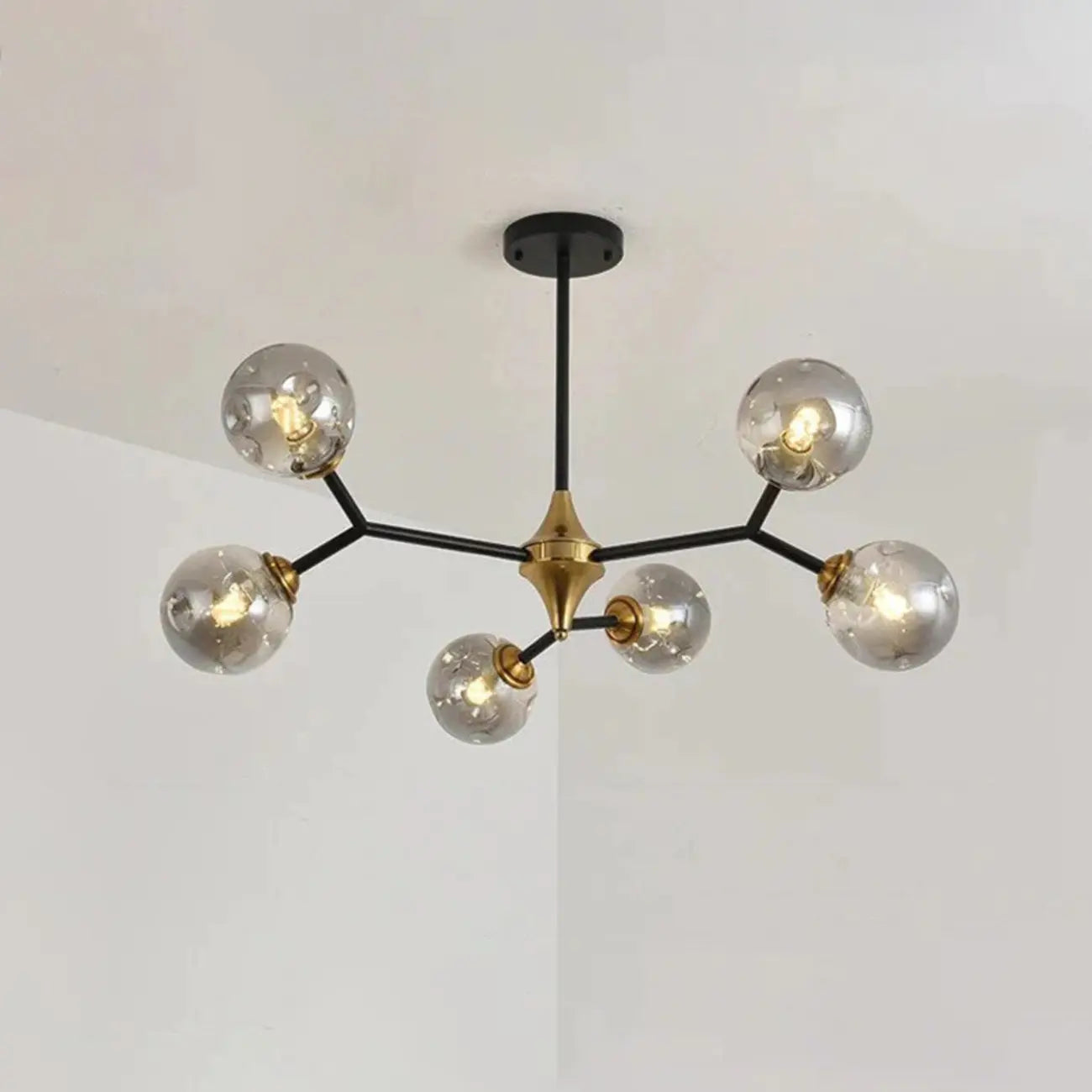Lustre Sputnik moderne en verre noir et or