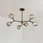 Lustre Sputnik moderne en verre noir et or