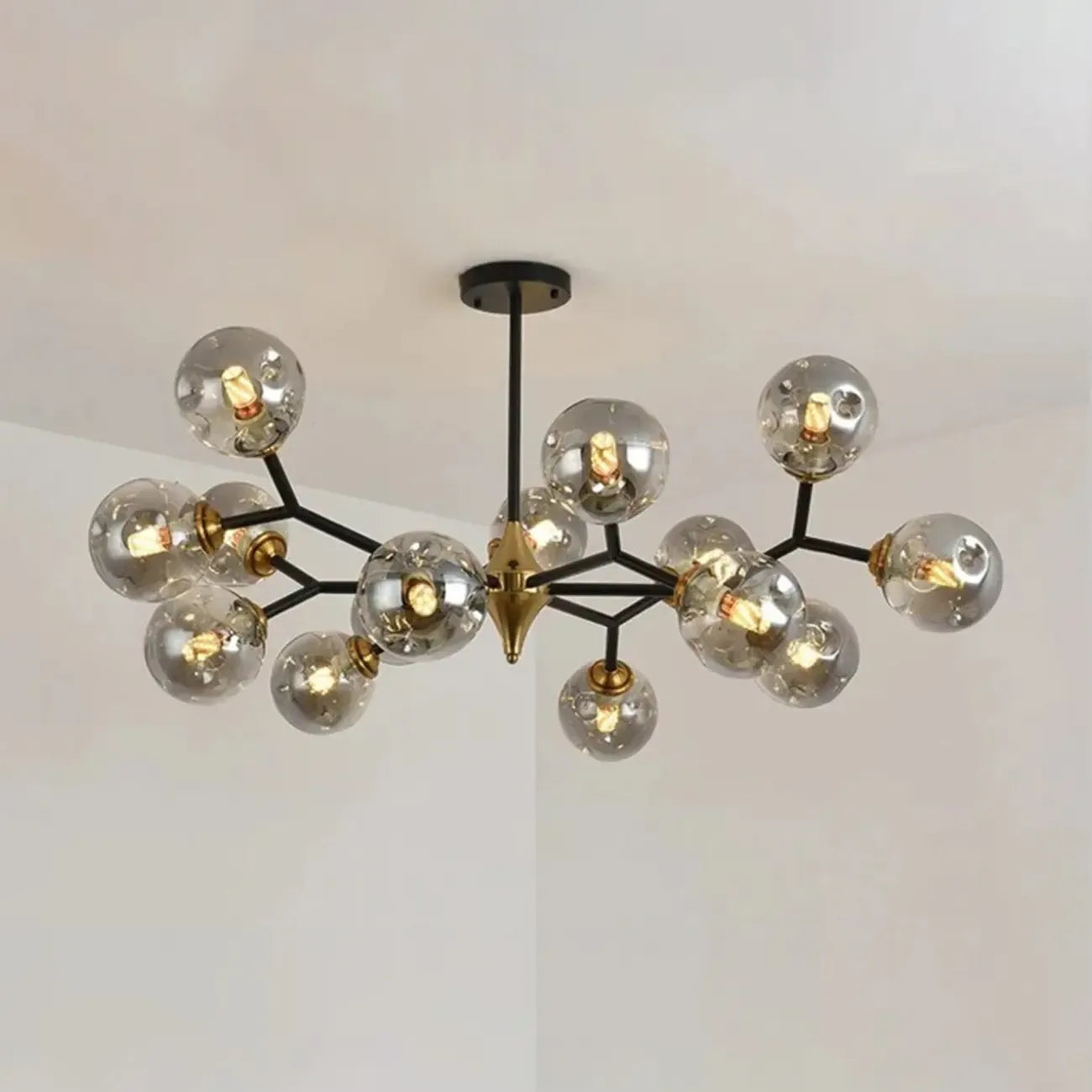 Lustre Sputnik moderne en verre noir et or