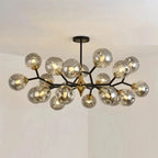 Lustre Sputnik moderne en verre noir et or