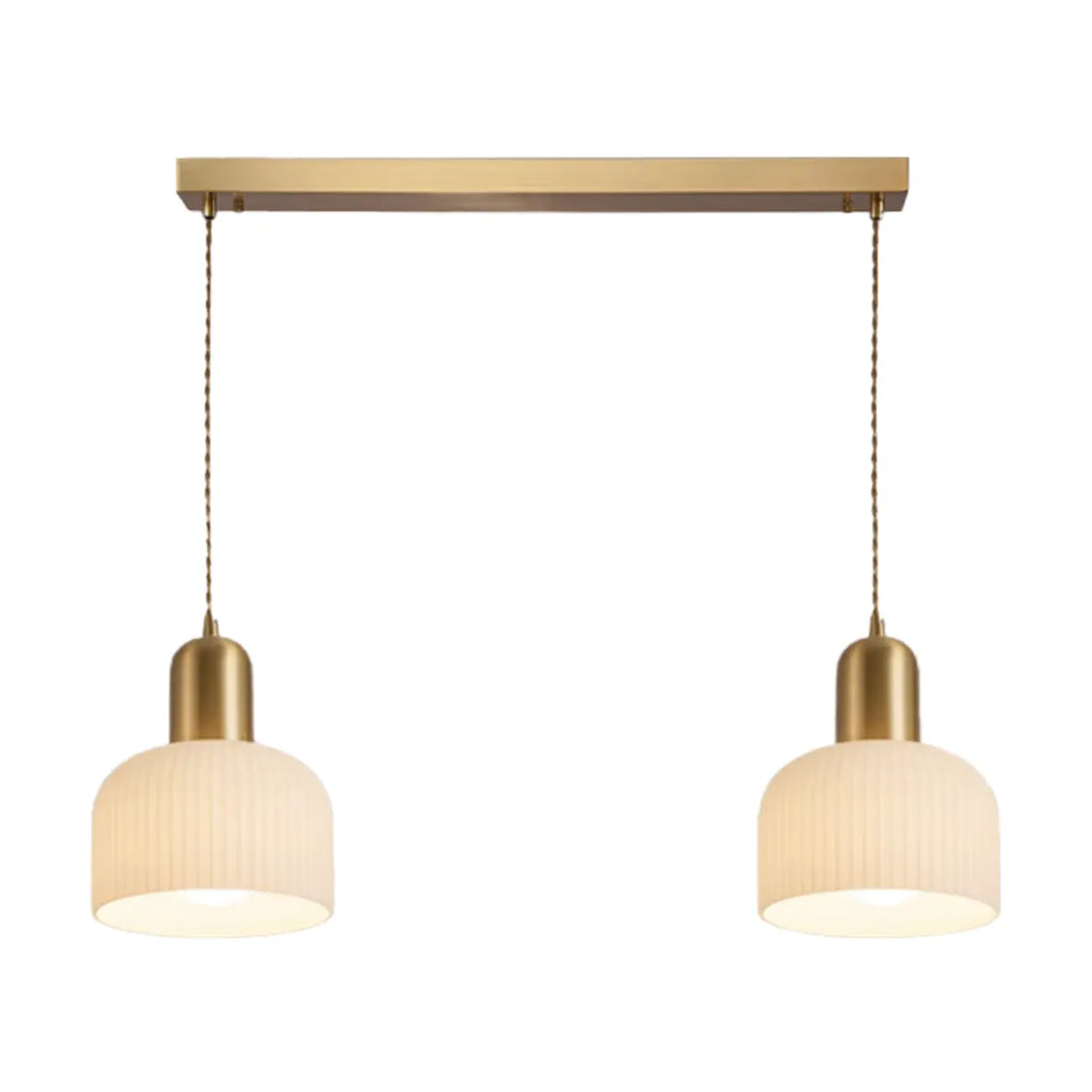 Luminaire cylindrique moderne en verre blanc et or pour îlot de cuisine