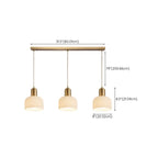Luminaire cylindrique moderne en verre blanc et or pour îlot de cuisine