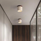 Plafonnier cylindrique moderne couleur pierre beige pour couloir