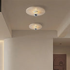 Plafonnier cylindrique moderne couleur pierre beige pour couloir