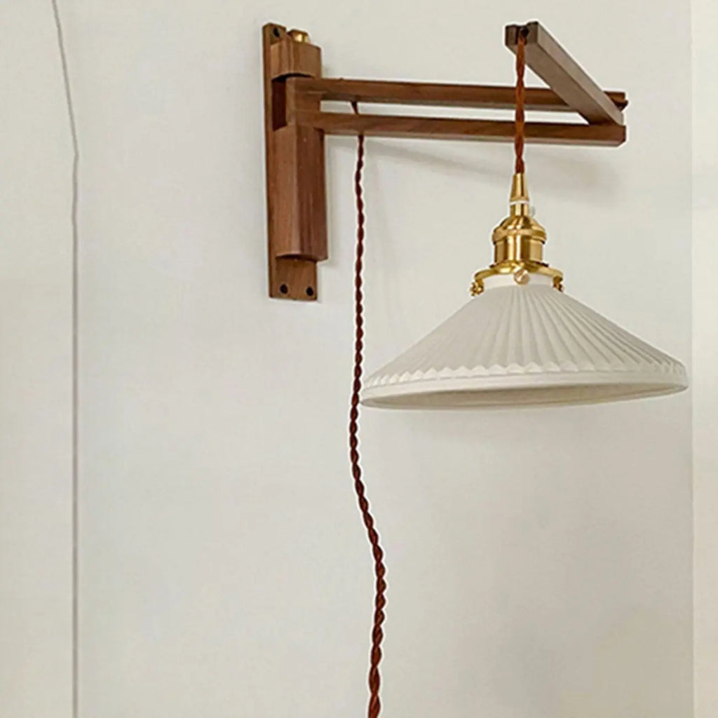 Applique murale minimaliste à bras articulé pour espaces intérieurs
