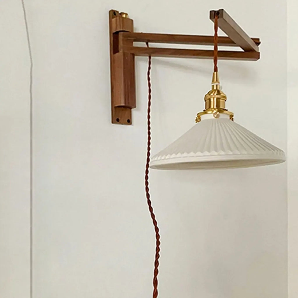 Applique murale minimaliste à bras articulé pour espaces intérieurs