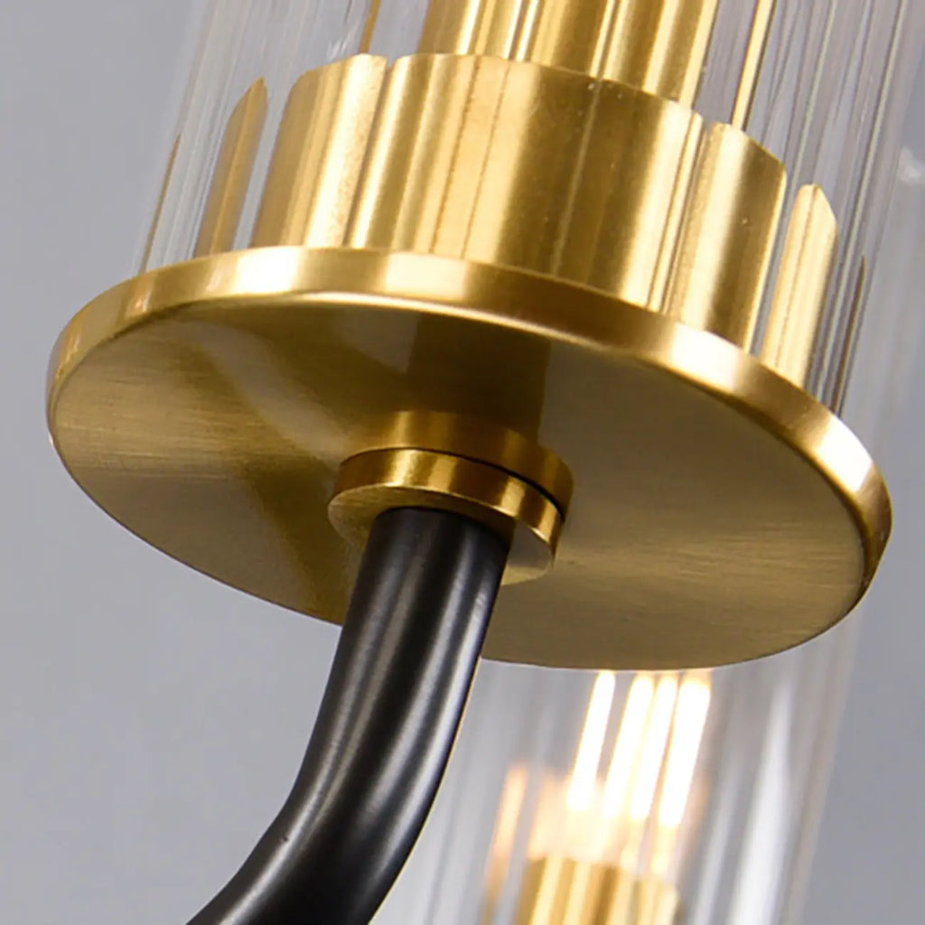 Lustre moderne rond noir et or avec abat-jour en verre transparent