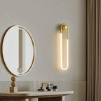 Applique murale ovale moderne dorée à LED pour coiffeuse