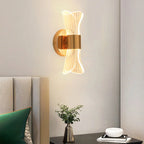 Applique murale LED dorée artistique à intensité variable pour l'éclairage de la chambre