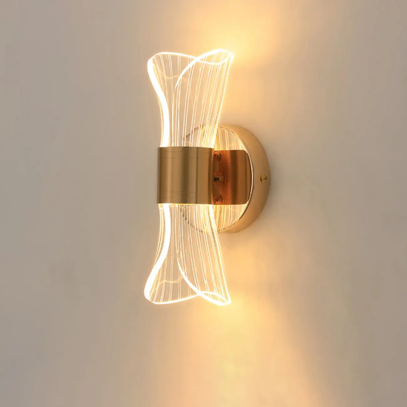 Applique murale LED dorée artistique à intensité variable pour l'éclairage de la chambre