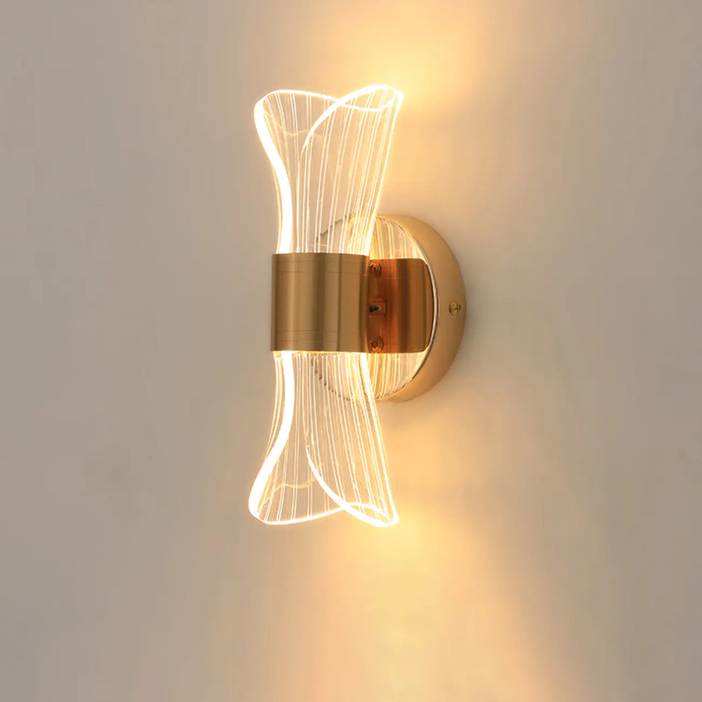 Applique murale LED dorée artistique à intensité variable pour l'éclairage de la chambre