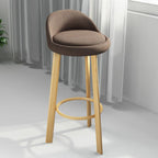 Tabouret de bar élégant et confortable, revêtu de tissu.