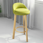 Tabouret de bar élégant et confortable, revêtu de tissu.