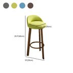 Tabouret de bar élégant et confortable, revêtu de tissu.