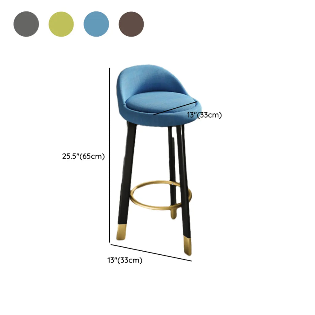 Tabouret de bar élégant et confortable, revêtu de tissu.