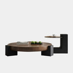 Table basse trépied ronde en bois noir et marron au style funky