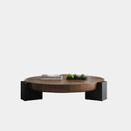 Table basse trépied ronde en bois noir et marron au style funky