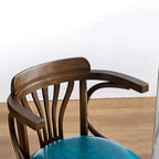 Sgabello da bar girevole imbottito in pelle blu anticata