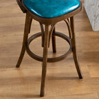 Sgabello da bar girevole imbottito in pelle blu anticata