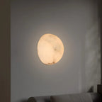 Applique murale géométrique moderne en métal avec finition dorée