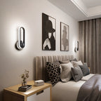 Applique murale LED minimaliste avec finition métallique pour chambre à coucher