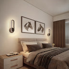 Applique murale LED minimaliste avec finition métallique pour chambre à coucher