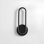 Applique murale LED minimaliste avec finition métallique pour chambre à coucher
